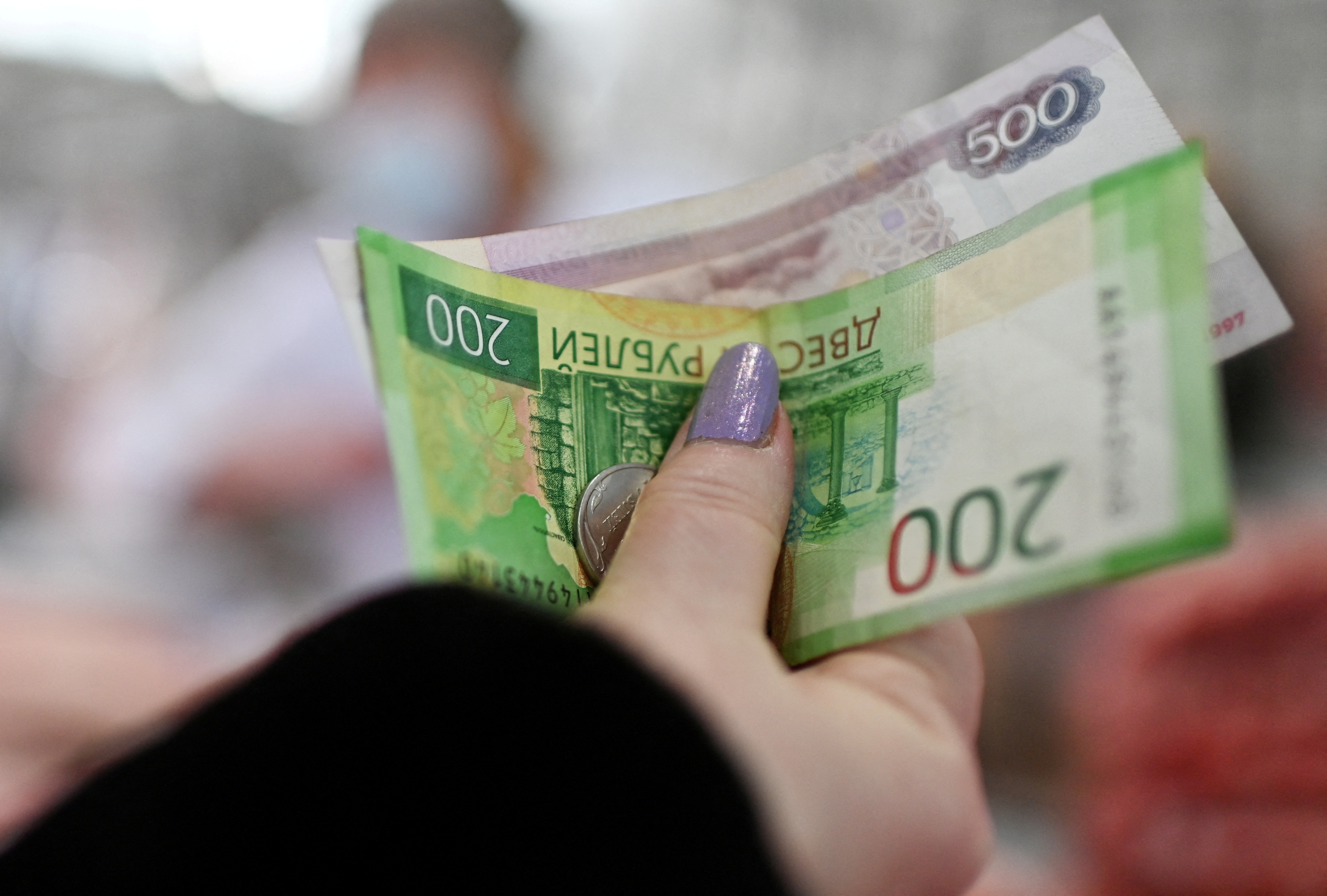 Russian media and state-controlled bank analysts have largely avoided discussing a potential connection between the rouble's 9% drop against the U.S. dollar and the Ukrainian surprise attack on the Kursk region.
Image Source: Reuters